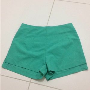 Green high waisted shorts